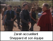 Zarah accueillant Sheppard et son équipe